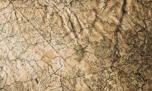 An old map on a weathered table